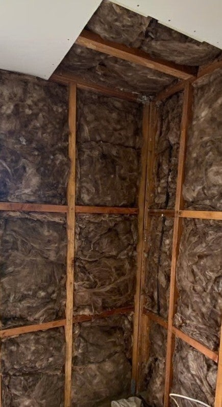 Exposed framing before relining · Farm Cove